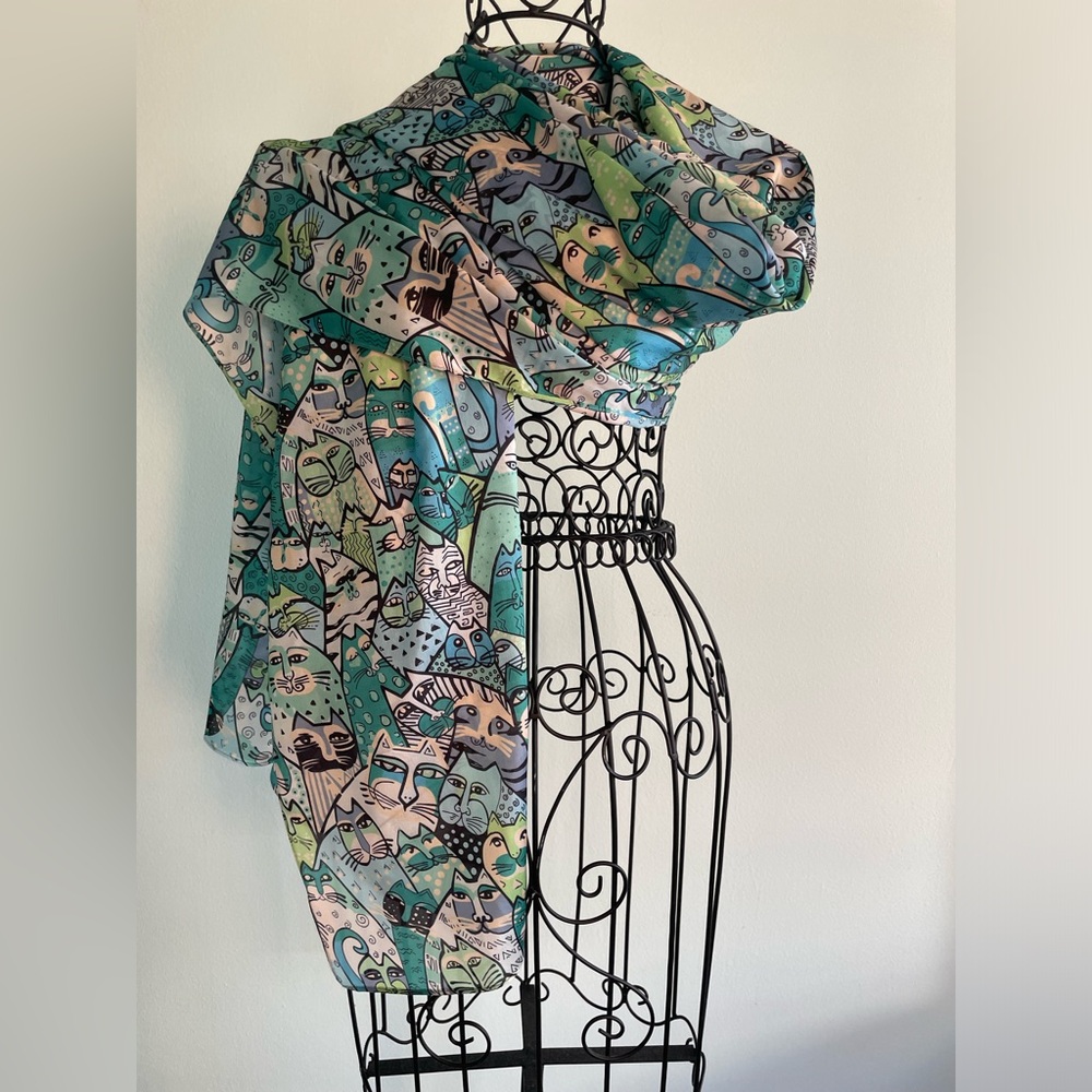 Silk scarf/wrap  in blue, turquoise, white, green and black animal “cat print”.